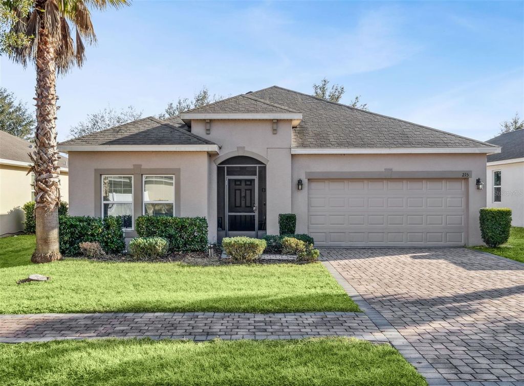 Photo of 215 Lakeshore Drive, Davenport, FL 33837 (MLS # O6390226)
