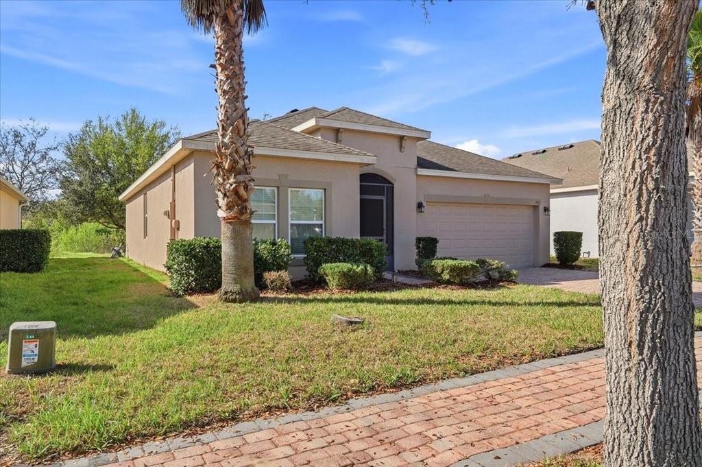 Photo of 215 Lakeshore Drive, Davenport, FL 33837 (MLS # O6390226)