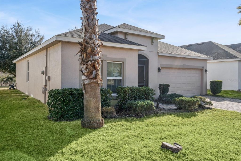 Photo of 215 Lakeshore Drive, Davenport, FL 33837 (MLS # O6390226)