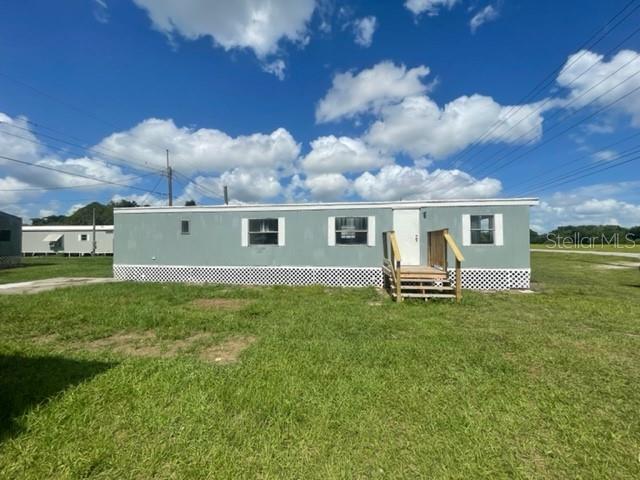 Cute remodeled 2 bedroom 1 bath mobile home is a quiet mobile home community! No HOA, good size lots & plenty of space to take a walk and enjoy the great Florida weather. Water and lawn maintenance are both included. Inside hook up for full size washer/dryer! Pets ok with pet fee, no large aggressive breeds. Freshly painted, new stairs, vinyl flooring, newer appliances and more! This home is available for move-in 9/13/2025. 550+ credit score, all applications considered.