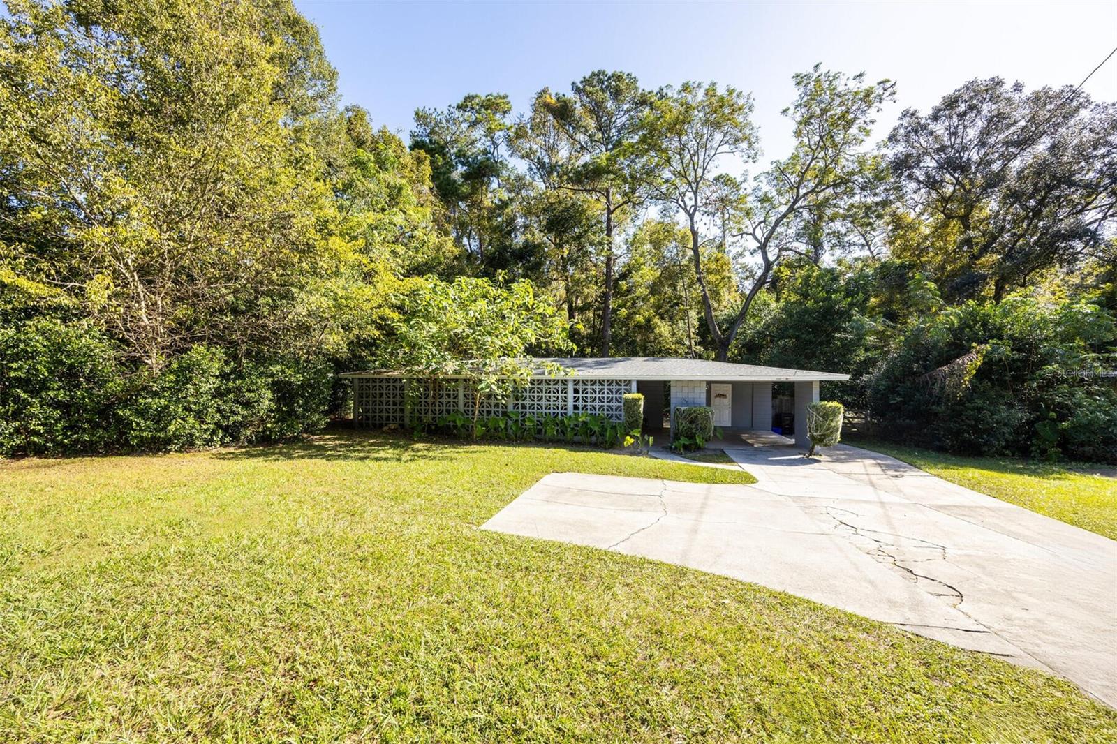 LOCATION, LOCATION, LOCATION! This completely remodeled mid-century 3-bedroom, 2-bath home is an absolute must-see! Perfectly situated next to the beautiful Loblolly Nature Area, this property combines modern updates with natural serenity. Inside, you’ll love the luxury vinyl plank flooring, abundant natural light, and a spacious kitchen featuring a gas stove, newer appliances, ample cabinet storage, and plenty of counter space. The home’s solid block construction and excellent insulation keep it cool in the summer and cozy in the winter. Outside, enjoy a huge fenced backyard—ideal for pets, entertaining, or simply relaxing. Conveniently located, you can bike to UF, walk to Westside Park, and access nearby schools with ease. Just minutes to Publix, Shands, North Florida Regional, shopping, restaurants, and so much more!
This charming, pet-friendly home offers the perfect blend of style, comfort, and convenience. Don’t miss your chance—schedule a showing today!