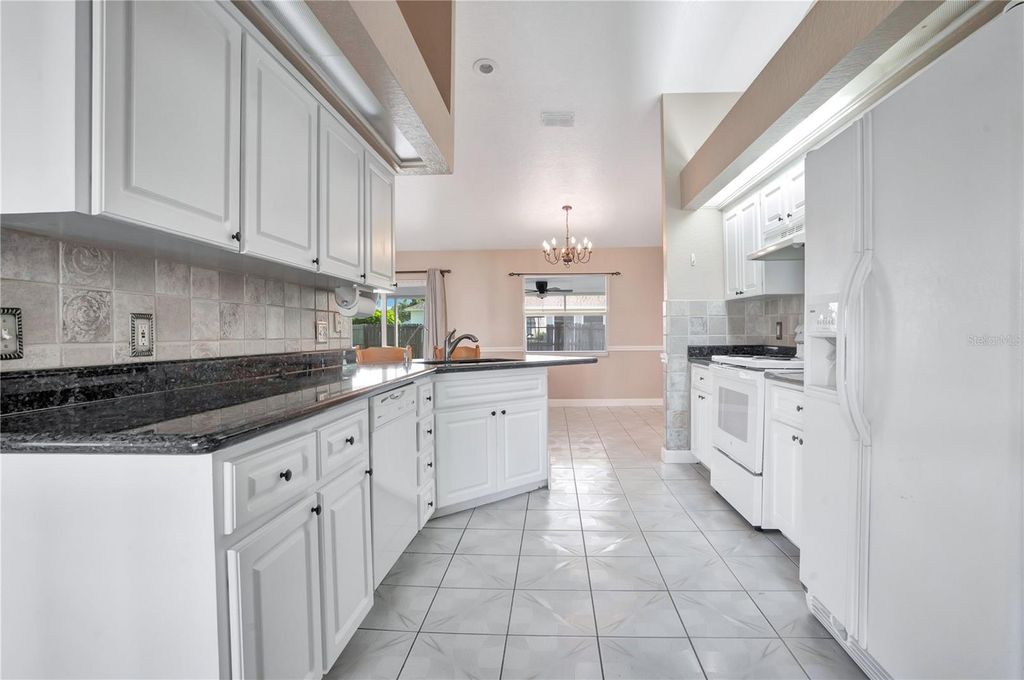 Photo of 667 Jessanda Cir, Lakeland, FL 33813 (MLS # O6426054)