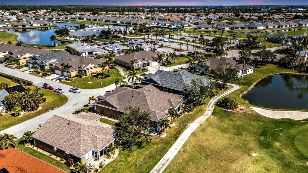 Photo of 24036 Buckingham Way, Port Charlotte, FL 33980 (MLS # C7513967)