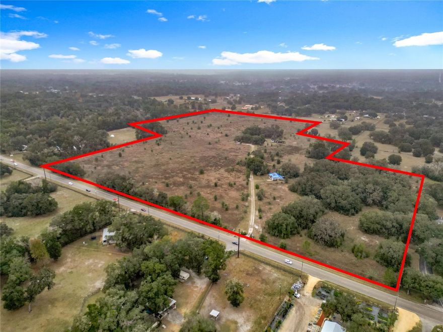 Nestled in the heart of Marion County’s renowned horse country, this impressive ±48 -acre ranch is fully fenced and features two well-appointed residences—a 4-bedroom, 3-bath main home and a 2-bedroom, 1-bath secondary home. Directly across from the 8,146-acre Hálpata Tastanaki Preserve along the Withlacoochee River, the property offers unmatched access to roughly 13 miles of multi-use equestrian trails and 15 miles of scenic hiking paths, perfect for year-round outdoor adventure.
Convenience complements the setting: Marion County Airport lies just minutes to the west, while Downtown Dunnellon is only a 10-minute drive. The World Equestrian Center and Downtown Ocala are easily reached within 25 minutes to the northeast, placing premier equestrian facilities, dining, and entertainment well within reach.
This central location also provides effortless access to the Nature Coast. Enjoy world-class flats fishing in Yankeetown or swim with the manatees in Crystal River—both only 30 minutes west. Major hubs such as Tampa and Gainesville are just over an hour away, offering additional convenience for travel, amenities, and recreation.