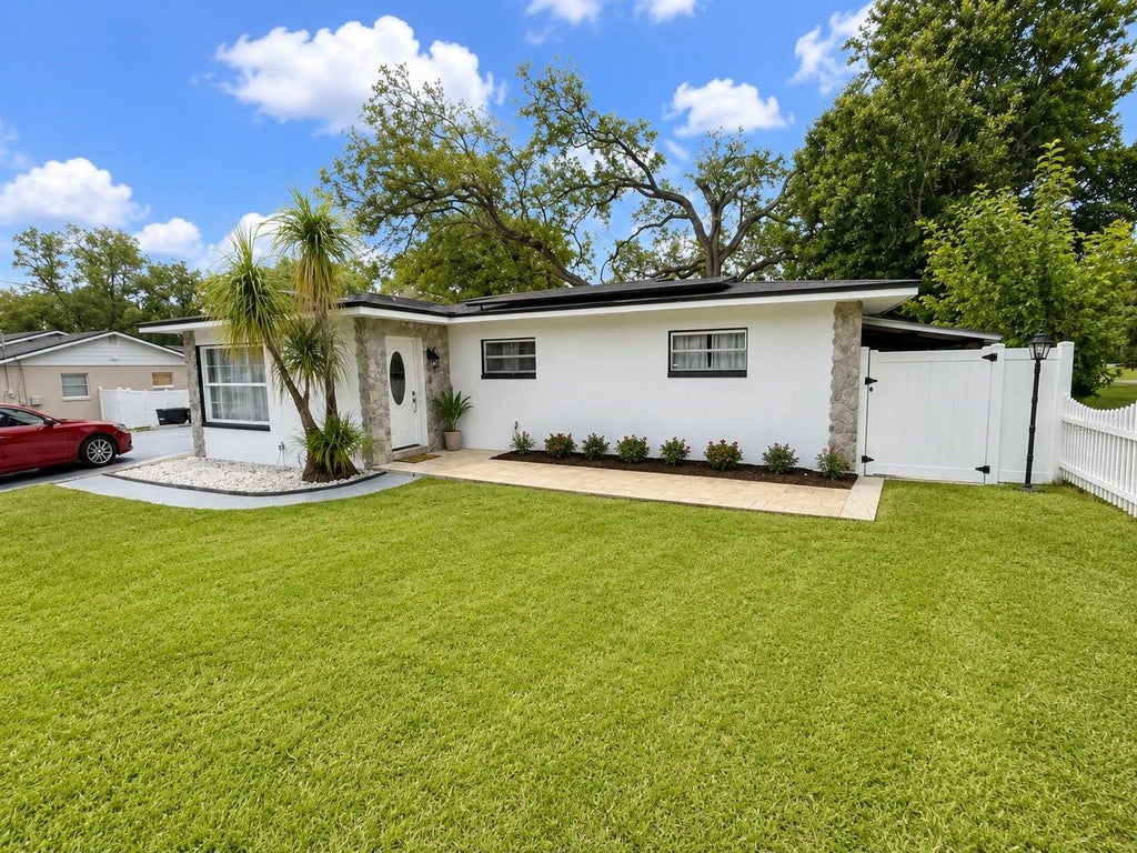 Photo of 8907 El Portal Drive, Tampa, FL 33604 (MLS # TB8539767)