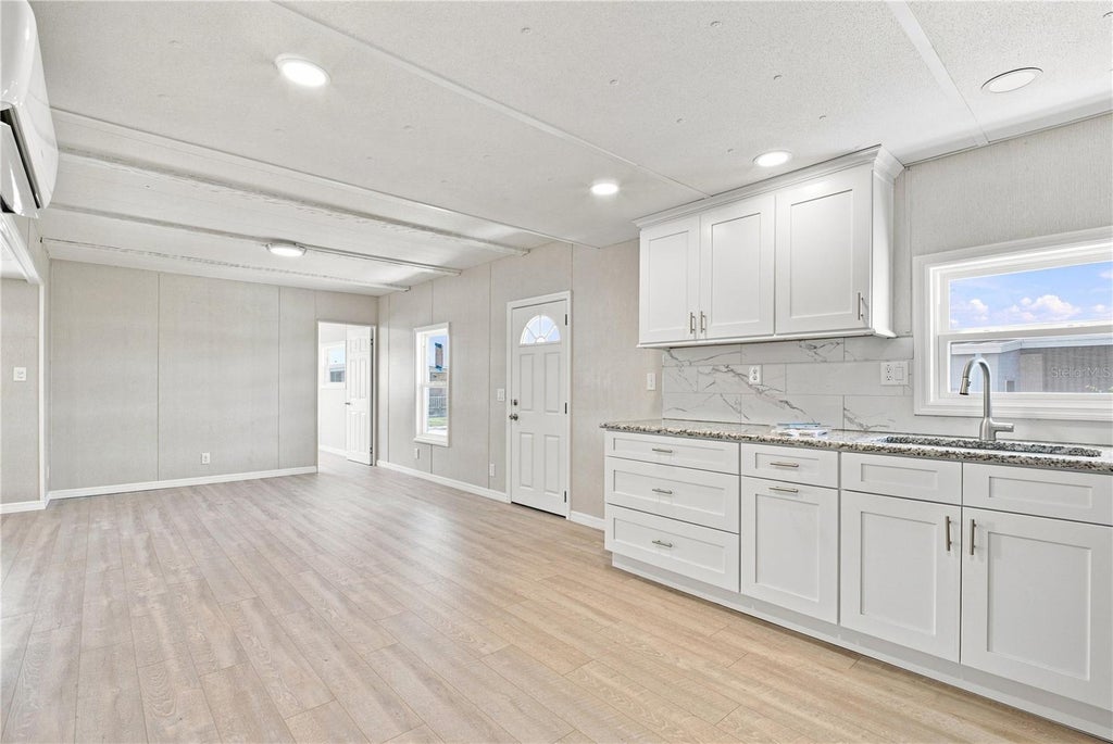 Photo of 10929 Tioga Drive, Port Richey, FL 34668 (MLS # TB8539005)