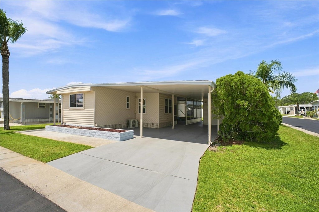 Photo of 10929 Tioga Drive, Port Richey, FL 34668 (MLS # TB8539005)