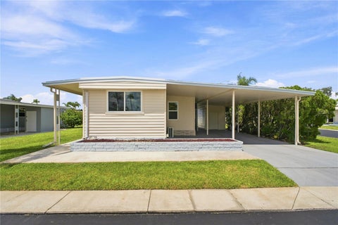Photo of 10929 Tioga Drive, Port Richey, FL 34668 (MLS # TB8539005)