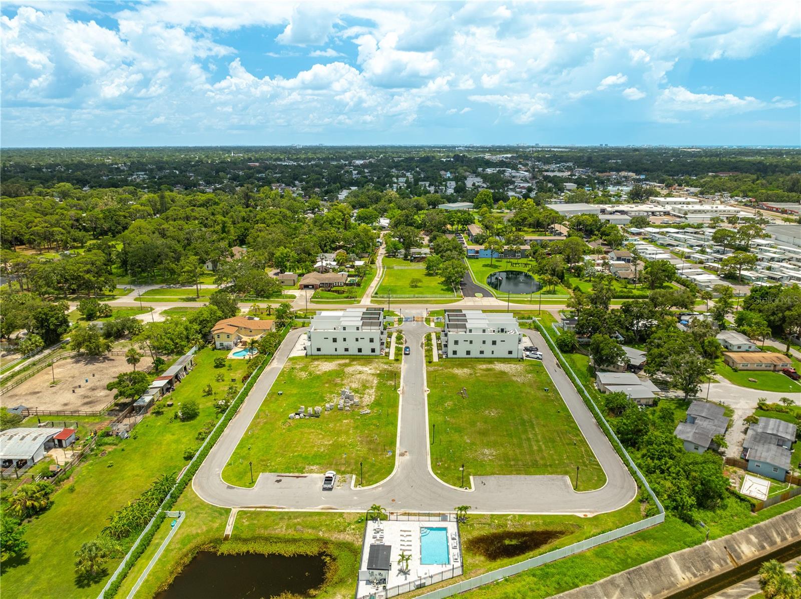 LATITUDES IN THE PARK TWNHMS - Residential