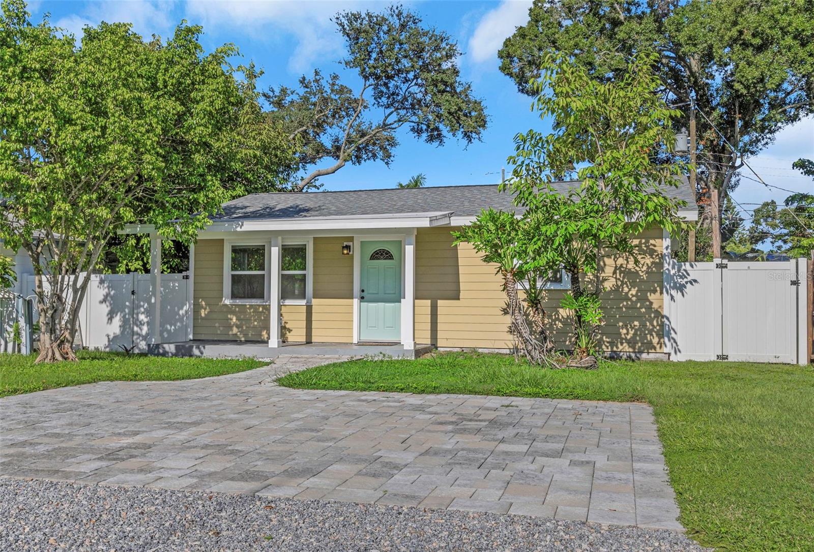 Live the Gulfport lifestyle in this colorful two-bedroom, one-bath home, near the vibrant Downtown Arts District with its galleries, restaurants, and lively entertainment.
Step inside to an open, light-filled layout designed for easy living. The kitchen is a standout with stainless steel appliances, butcher block countertops, a bold backsplash, and stylish cabinetry offering plenty of storage. Easy-care tile flooring flows throughout, while the updated bathroom features a modern vanity and a tub/shower combination.
Outside, enjoy off-street parking in front and a fully fenced backyard, ideal for relaxing or entertaining in privacy. The yard is enclosed with a newer 6’ white vinyl privacy fence, and a separate laundry room off the back door includes a convenient stackable washer and dryer.
This home also comes with practical upgrades and peace of mind: a new roof installed in 2019, a recently replaced main sewer line, and a full drywood termite treatment. As an added bonus, it did not flood during last year’s hurricane season.