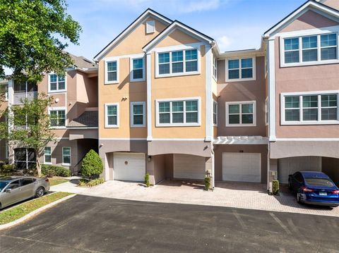 Photo of 6685 Queens Borough Avenue #202, Orlando, FL 32835 (MLS # O6296973)