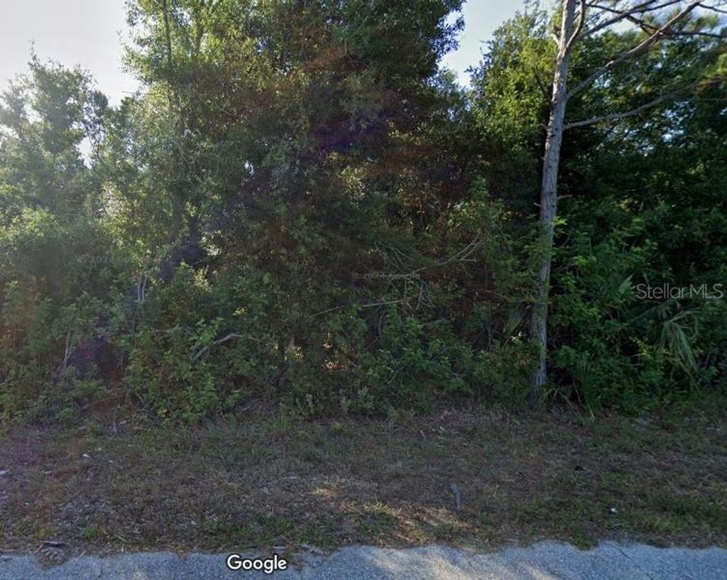 Photo of 7092 Lippman Road, Port Charlotte, FL 33981 (MLS # O6335814)