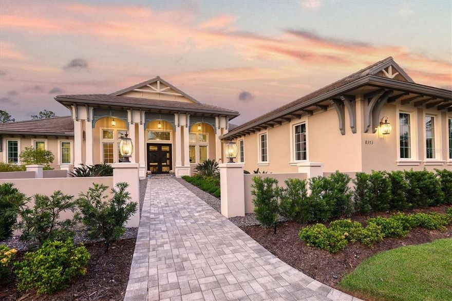 In the sought-after golf community, The Concession, this stunning custom estate with exquisite craftsmanship and architectural details is truly one of a kind. Situated on a lush one-acre envelope of mature landscaping with open lake views to the front, this masterpiece has perfect symmetry that leads you from the foyer, gallery, and great room to the expansive outdoor living spaces. The intricate vaulted beamed ceilings in the home paired with custom moldings, designer window treatments and lighting make this one to marvel. The expansive kitchen with large island, gas range, and walk-in pantry is a chef’s dream and offers open views to the outdoor living area and surrounding preserves. The luxurious master suite with an adjacent exercise room and custom-designed closets brings nature indoors as the master bath opens onto the private garden. With a substantial walk-in shower, free-standing soaking tub, and dual vanities, this master bath is an ideal oasis. Two bedroom suites share a private courtyard. In addition, a formal dining area, bonus room, office with flanking 10-foot sliding doors, and a half bathroom complete this home. Step outside to the outdoor kitchen and dining area and separate sitting area under the gazebo with views of the breathtaking pool and spa. The fenced-in large backyard with a garden overlooking the preserve will not disappoint. Other notable features include beautiful wood floors, a fireplace with stone mantle, impact windows, generator, side-entry three-car garage, and a spacious laundry room. With all this and more; nothing compares.