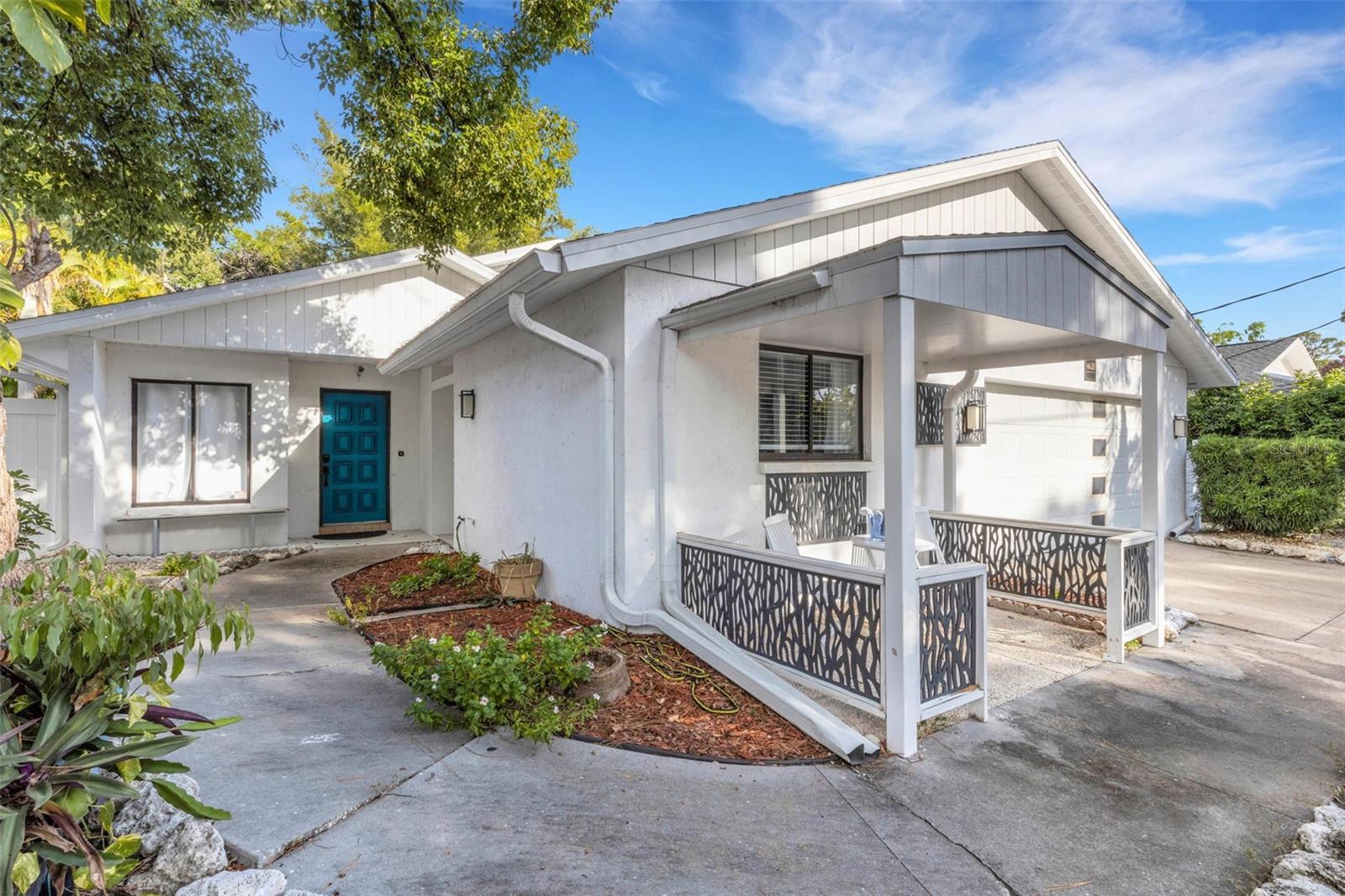 Amazing location with this 2 Bedroom- 2 Bathroom- 2 Car Garage with a heated pool and spa. New roof in 2019, newer plumbing in 2022, newer pool heater, screened in pool area with a very private setting. Open floor plan with a very large family room with a wood burning fireplace, separate living room and dining room. Easy access to downtown, SRQ airport, upscale shopping, the iconic John and Mable Ringling Museum, Ringling College of Art and Design, as well as the world-renowned beaches of Siesta Key and Lido. Enjoy a walk down to the pet free zone Sapphire Shores Park. This home is above sea level (no mandatory request for flood insurance) no HOA fee.