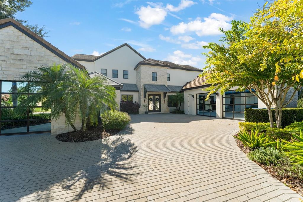 Photo of 5024 Sawyer Cove Way, Windermere, FL 34786 (MLS # O6348086)