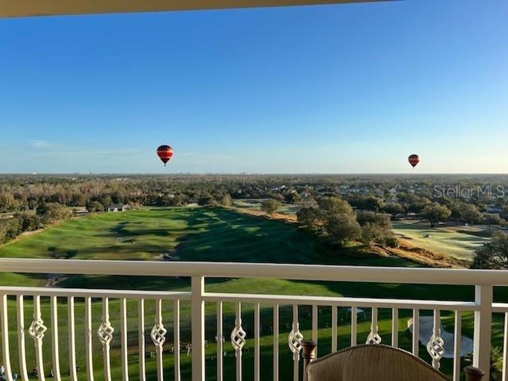 Photo of 7593 Gathering Drive #803, Reunion, FL 34747 (MLS # O6382662)