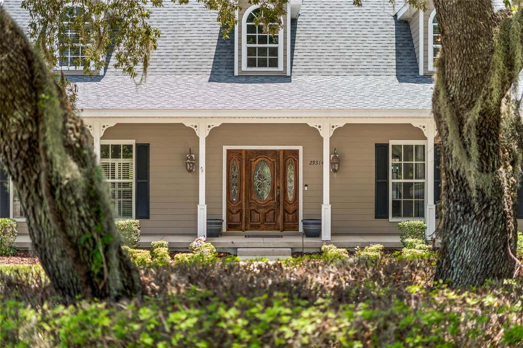 Photo of 29314 W Old Mill Ml, Tavares, FL 32778 (MLS # O6429683)