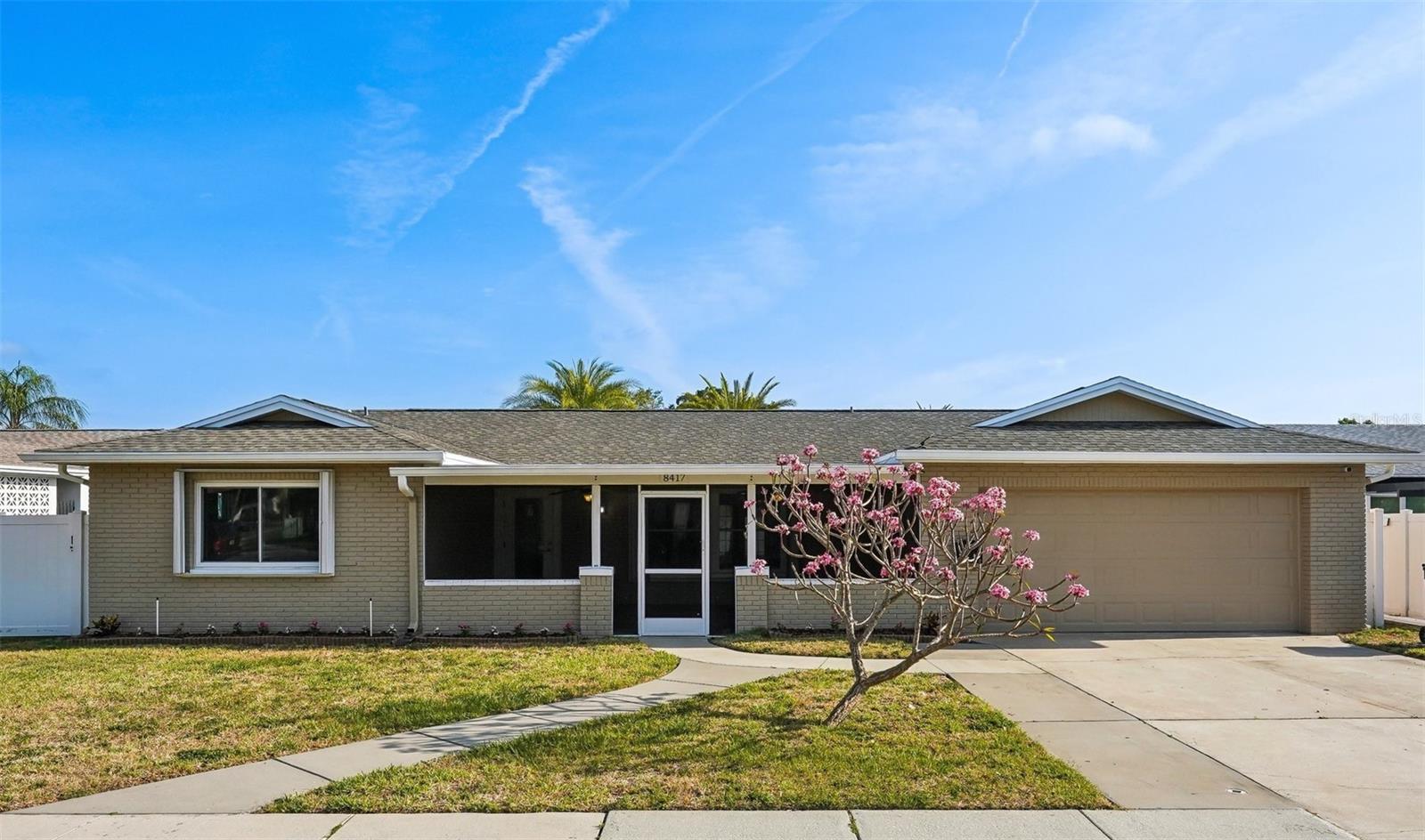 One or more photo(s) has been virtually staged. PHENOMENAL VALUE – STUNNING TOP-TO-BOTTOM RENOVATION NEAR TAMPA BAY | NO HOA!
Absolutely beautiful 3-BEDROOM, 2-BATH home in the desirable BAY CREST neighborhood, featuring ALL HURRICANE IMPACT-RATED WINDOWS AND DOORS, plus COMMUNITY BAY ACCESS and a PRIVATE BOAT RAMP. Completely renovated inside and out, this home offers the feel of NEW CONSTRUCTION just minutes from the waters of TAMPA BAY — and the freedom of NO HOA RESTRICTIONS.
Every detail has been thoughtfully updated, including a NEW HVAC SYSTEM for year-round comfort and FRESH EXTERIOR PAINT (2025). The OPEN-CONCEPT LAYOUT is filled with natural light and features LUXURY VINYL PLANK FLOORING THROUGHOUT, MODERN 5¼” BASEBOARDS, RECESSED LIGHTING, and a SOPHISTICATED NEUTRAL COLOR PALETTE.
The GOURMET KITCHEN is the showpiece of the home, boasting a LARGE CENTER ISLAND with cooktop and sleek range hood, GRANITE COUNTERTOPS, DESIGNER TILE BACKSPLASH, and STAINLESS-STEEL APPLIANCES. Both bathrooms have been beautifully remodeled with CUSTOM TILE SHOWER DESIGNS and STYLISH FIXTURES.
Two sets of FRENCH DOORS open to a SPACIOUS SCREENED-IN BACK PORCH, perfect for entertaining or relaxing while enjoying the FLORIDA BREEZE. The PRIVATE, FULLY FENCED VINYL BACKYARD offers plenty of space for play or pets and includes a CONVENIENT STORAGE SHED. A CIRCULAR DRIVEWAY provides ample parking and easy access.
Enjoy the best of COASTAL LIVING just moments from the bay, with MODERN COMFORT, STUNNING UPDATES, and NO HOA. This TURNKEY HOME is MOVE-IN READY and waiting for you!