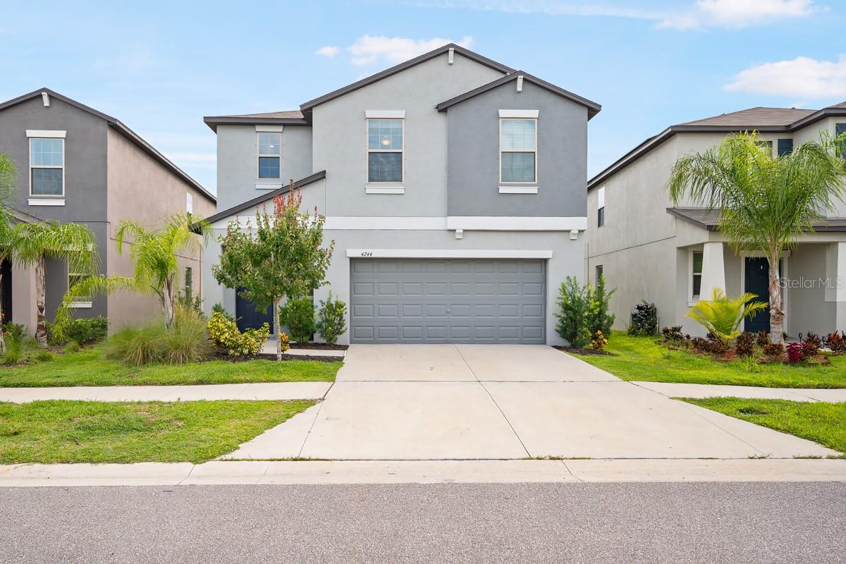Must See! This home is located in the desirable Vines at Cypress Creek Subdivision! Enjoy this two story, 4 bedroom home with an additional spacious upstairs loft. If your plans include a home office, arts and craft room, or a Den, it is all up to you! The downstairs living room is open to the kitchen and dinning area with sliding glass doors that open to your large private backyard. No backyard neighbors and LAWNCARE IS INCLUDED! The floorplan offers plenty of storage space and a 2 car garage. Some of the updates include a freshly painted interior completed with a neutral color palette and the first floor is complete with neutral ceramic tile! That's not all...the community has a beautiful pool for those hot Florida days, clubhouse, fitness center and a playground. Meticulously kept and move in ready! Washer & Dryer Included! Cable and high speed internet is also included! LOW ELECTRIC bills averaging $39.00 a month due to the solar panels! Landlord will require renters to have insurance, please call for details. Reach out today for your private showing. $125 Tenant Processing Fee after acceptance of applicant(s).