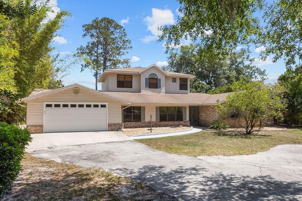 Photo of 1320 Trail By The Lake, Deland, FL 32724 (MLS # V4948509)