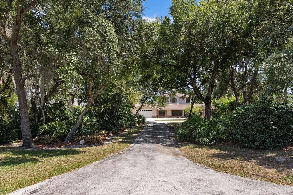 Photo of 1320 Trail By The Lake, Deland, FL 32724 (MLS # V4948509)