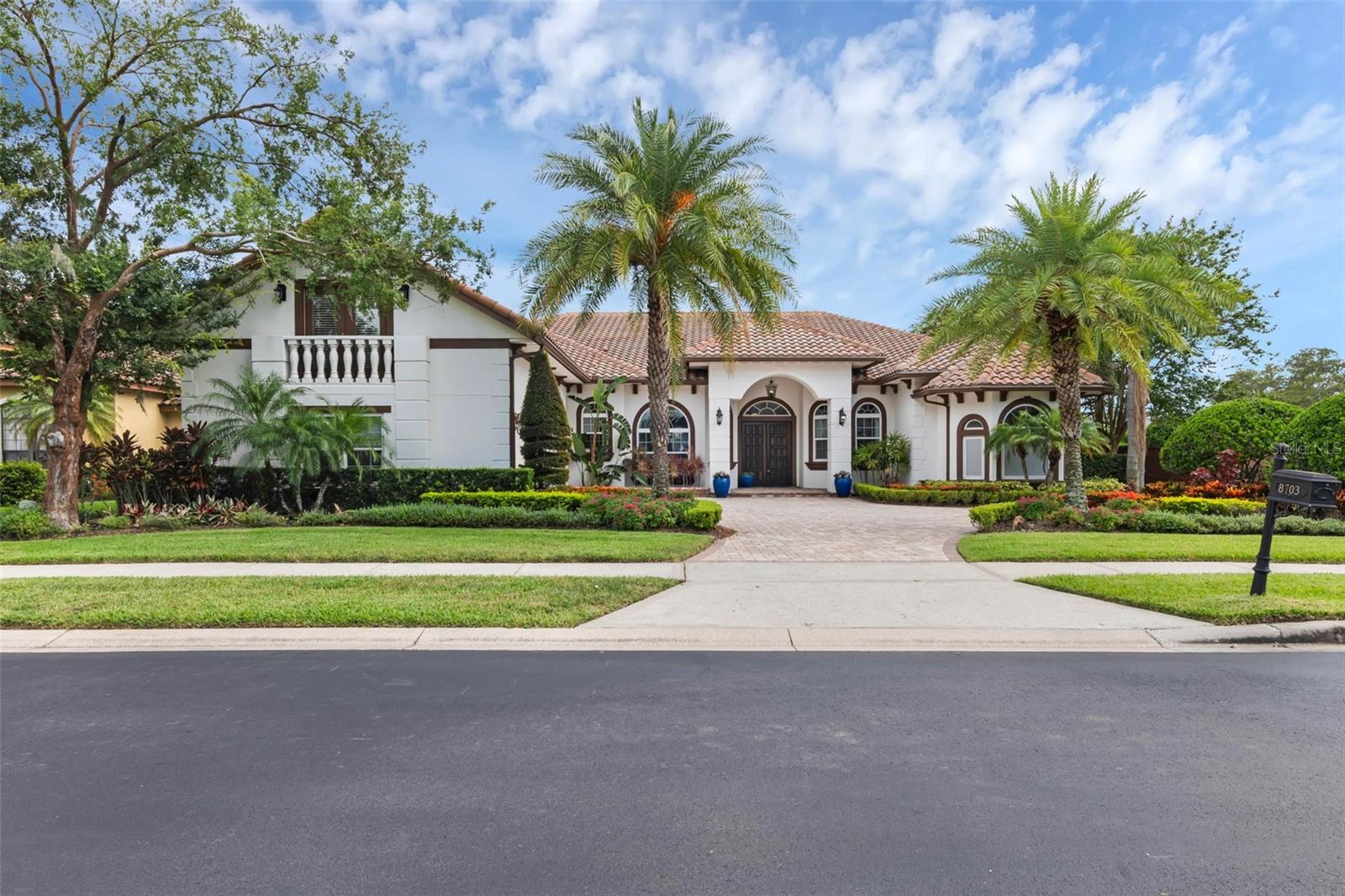 Welcome to 8703 Cypress Reserve Cir — a beautifully remodeled 5-bedroom, 4.5-bath luxury residence tucked behind the gates of The Reserve at Cypress Point. Nearly 5,000 sq ft of elegant living space and thoughtful upgrades make this home the perfect blend of comfort, design, and entertainment.
Step inside to soaring ceilings, designer lighting, and a formal dining room with stunning accent details. The gourmet kitchen shines with custom cabinetry, new backsplash, and LED accents, flowing seamlessly into a family room anchored by a striking tiled feature wall.
Upstairs, enjoy a dedicated theater room and versatile game loft — ideal for movie nights, a playroom, or friendly poker games. The primary suite is a serene retreat with a spa-inspired bath and sparkling Swarovski chandelier.
Step outdoors to your private screened pool and spa, or host unforgettable gatherings in the summer kitchen with tiki hut. The Reserve at Cypress Point offers resort-style amenities including tennis & pickleball courts, playground, tree-lined streets, and lush landscaping.
Additional upgrades include updated plumbing & electrical, centralized audio/video, and all-new fixtures throughout. Zoned for top-rated schools and minutes from Restaurant Row, this home delivers the lifestyle you’ve been waiting for — in one of Orlando’s most coveted communities.