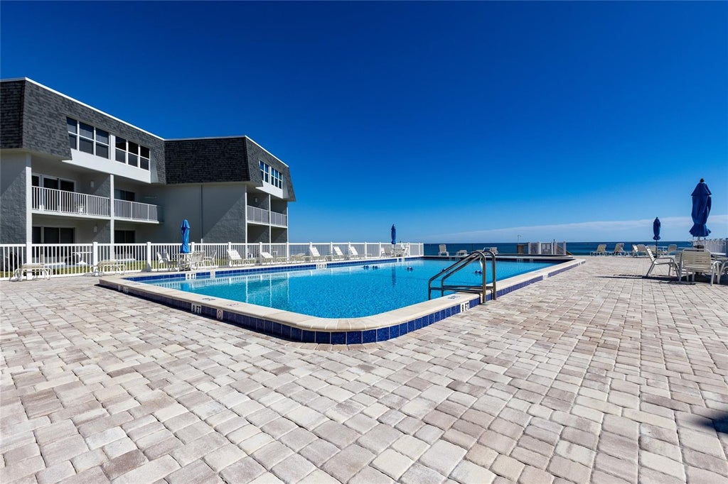 Photo of 4831 Saxon Drive #1080, New Smyrna Beach, FL 32169 (MLS # NS1089393)