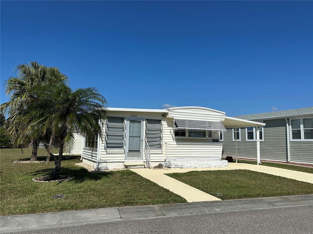 Photo of 6583 Hikina Drive, North Port, FL 34287 (MLS # C7521281)