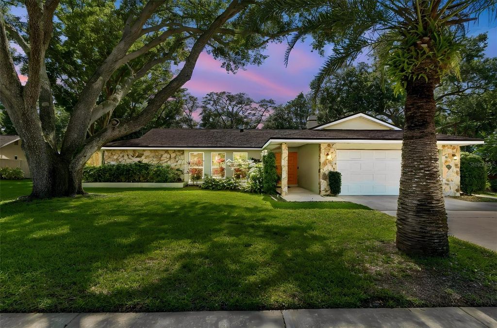 Photo of 515 Sandy Hook Road, Palm Harbor, FL 34683 (MLS # TB8513657)