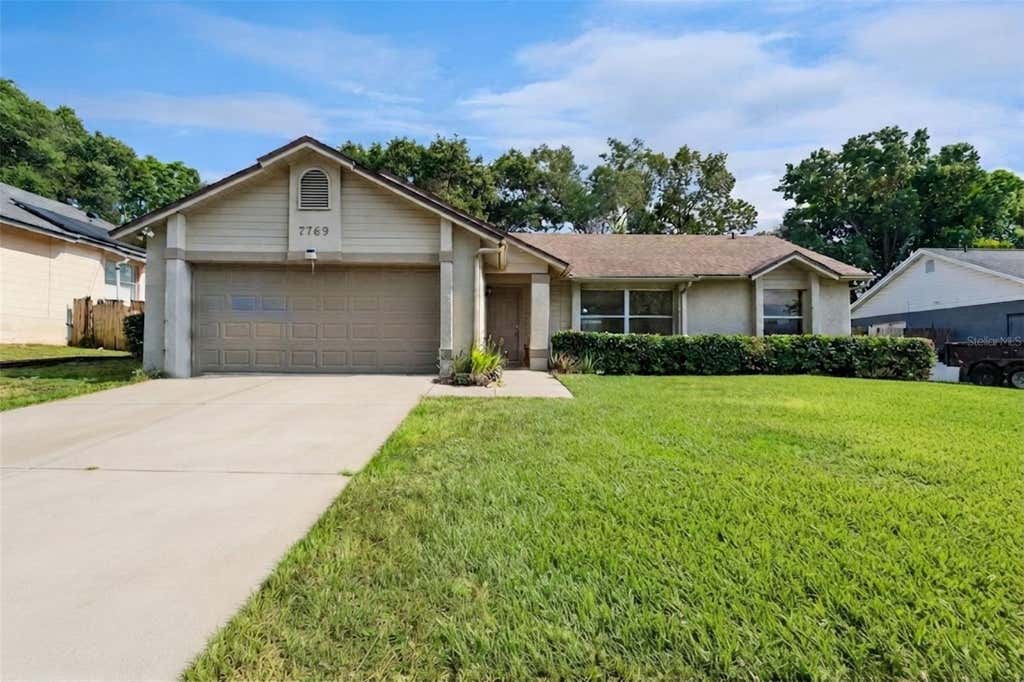 Photo of 7769 Barberry Dr, Orlando, FL 32835 (MLS # O6430707)