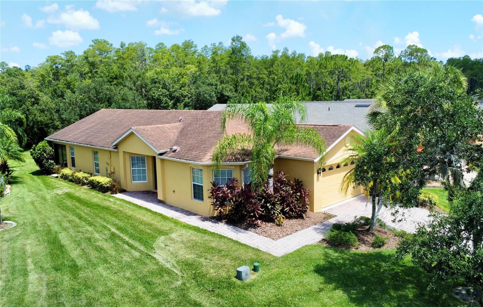 Beautiful BORDEAUX model on a CANAL & CONSERVATION lot in Venezia subdivision of Solivita. PRIME LOT with wide width on entrance side & deep backyard. GREAT VIEWS of CONSERVATION & CANAL from the SCREENED and COVERED LANAI. Roof new in 2016. HVAC new in 2019. MyQ Garage Door Motor new in 2025. 24" CERAMIC TILE -ENTIRE HOME. KITCHEN boasts GRANITE COUNTERS & BACKSPLASH. STAINLESS STEEL SLIDE IN Range (2022). STAINLESS STEEL MICROWAVE in 2022. Breakfast Nook with plenty of space to eat. RECESSED LIGHTING. Lower Cabinets have PULL OUTS. Primary Suite has a door leading to lanai and has 2 WALK IN closets. Its bathroom has DUAL SINKS, a walk-in shower & linen closet. Laundry room includes upper cabinets. BLINDS throughout home. CEILING FANS in most rooms. LANAI is COVERED & SCREENED and has a long easterly facing view of the CANAL & CONSERVATION. Garage floor is painted with epoxy paint.
**See the FULL LENGTH VIDEO on Tour Link 1.**
***Solivita is an active adult 55+ community located in Kissimmee, Florida. It is approximately 50 minutes from Disney World & the Orlando International Airport. Solivita has a total of 5,470 homes. Approximately 10,000 - 11,000 people live in Solivita during the winter while approximately 7,500 live in Solivita during the summer. Enjoy your active years in this piece of paradise. Solivita's amenities include: - a manicured SOFTBALL diamond & field - 36 holes of CHAMPIONSHIP GOLF that can be played by joining the Stonegate Golf Club or paying as you go - 2 STATE of the Art AMENITY centers with updated exercise equipment, yoga studio & meeting rooms - 3 restaurants - 14 HEATED POOLS - 17 PICKLEBALL courts - 9 TENNIS courts - 4 BOCCE BALL courts - 4 SHUFFLEBOARD courts - 3 HORSESHOE pits - a BILLIARDS room - miles of bike paths - 2 DOG PARKS (Small & Large Dogs) - Corn Hole - Tot Lot PLAYGROUND - COMMUNITY GARDEN - over 250 resident clubs. The HOA: - maintains the LANDSCAPING & IRRIGATION systems in the common areas as well as at individual homesites - maintains the roads throughout the community - PROVIDES SECURITY with gate guards and mobile patrols including the Polk County Sheriff - allows AUTOMATED GATE ACCESS for residents via license plate readers - provides residents with Fiber Optic Internet & TV service.***Poinciana Lakes Plaza is a MAJOR NEW SHOPPING CENTER that opened directly across from the Solivita Main Gate in Summer of 2024. It features Sprouts Grocery, TJ MAXX, Ross, Burlington, Rack Room Shoes, 5 Below, Ulta, Outback, First Watch, 5 Guys, Urgent Care, Dentist, TD Bank, Petco & Hair Cuttery PLUS MORE TO COME.***