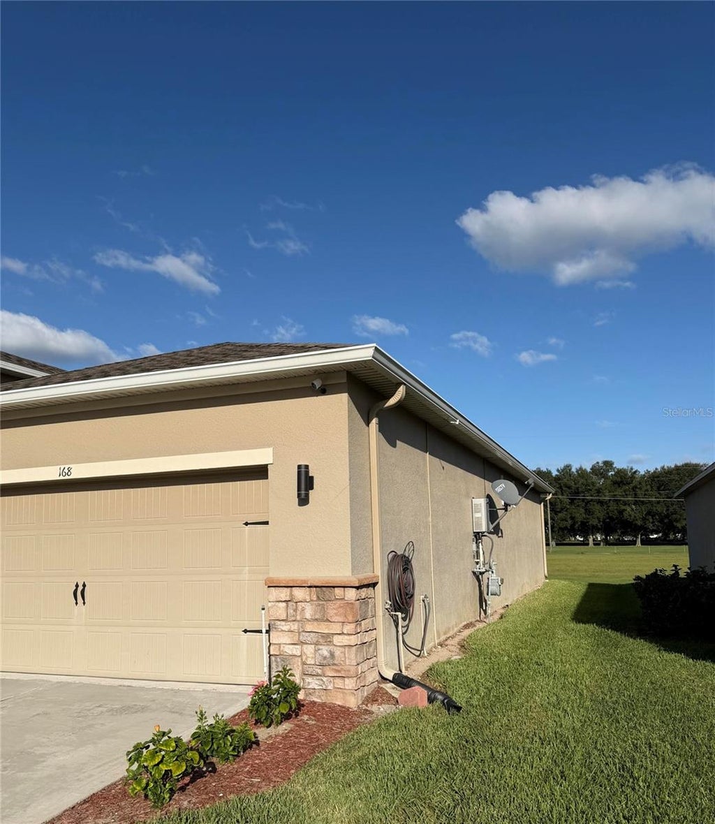 Photo of 168 Waterside Circle, Winter Haven, FL 33880 (MLS # O6450768)
