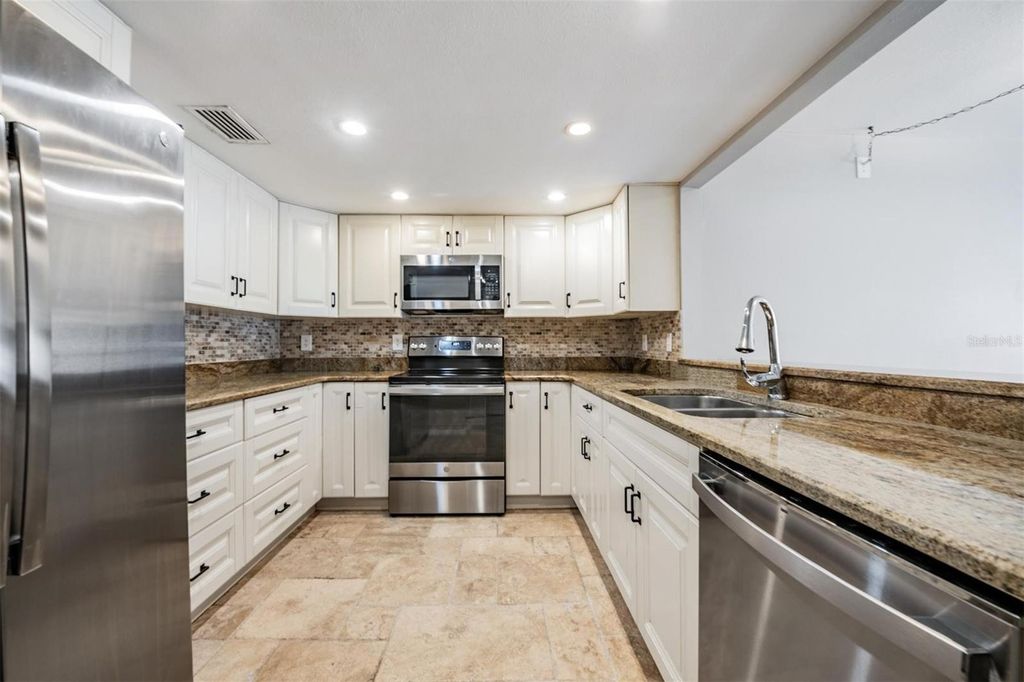 Photo of 13602 S Village Drive #1204, Tampa, FL 33618 (MLS # TB8471898)