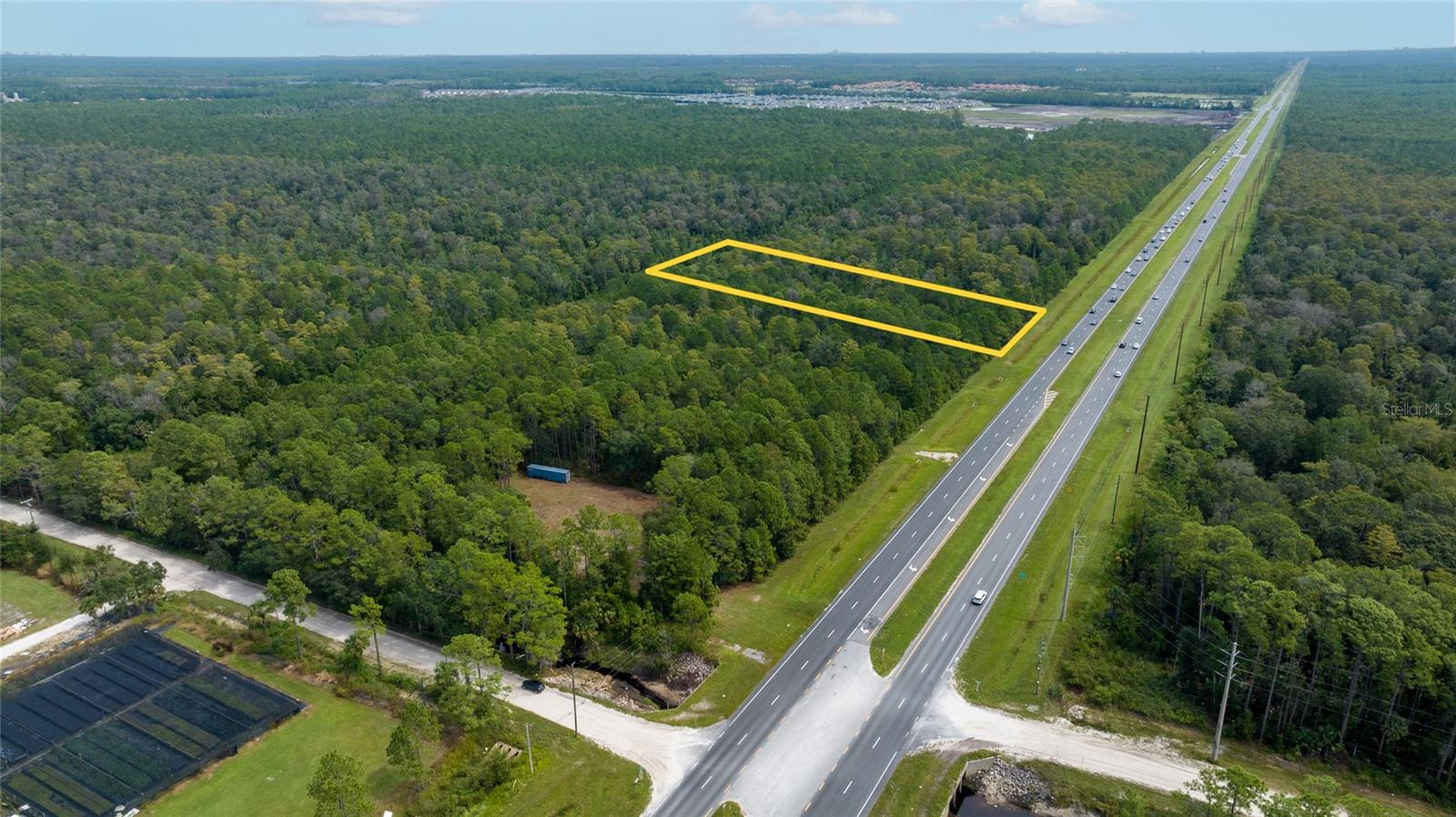 DEVELOPERS/INVESTORS! 165 feet of DIRECT frontage on busy SR-44 in New Smyrna Beach! PRIME location for future development. New Smyrna is an area of rapid growth with new development heading West. This property is currently zoned RCC and is surrounded by several large developments such as Venetian Bay and the New Smyrna Speedway. The almost 400 acres to the North (adjacent to Venetian Bay) is currently zoned PUD.
Buyers to discuss rezoning process for their intended use with Volusia County. All information in this listing is intended to be accurate but cannot be guaranteed. Buyers/Buyers' agents to perform due diligence.