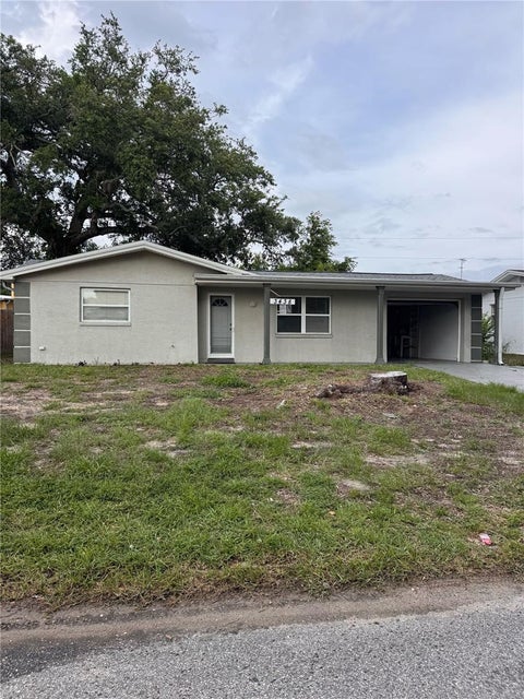 Photo of 3438 Kimberly Oaks Drive, Holiday, FL 34691 (MLS # TB8515227)