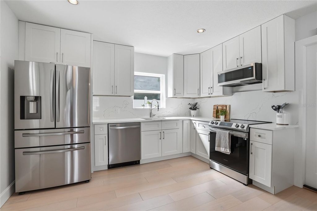 Photo of 4043 Shore Acres Boulevard NE, St Petersburg, FL 33703 (MLS # TB8493769)