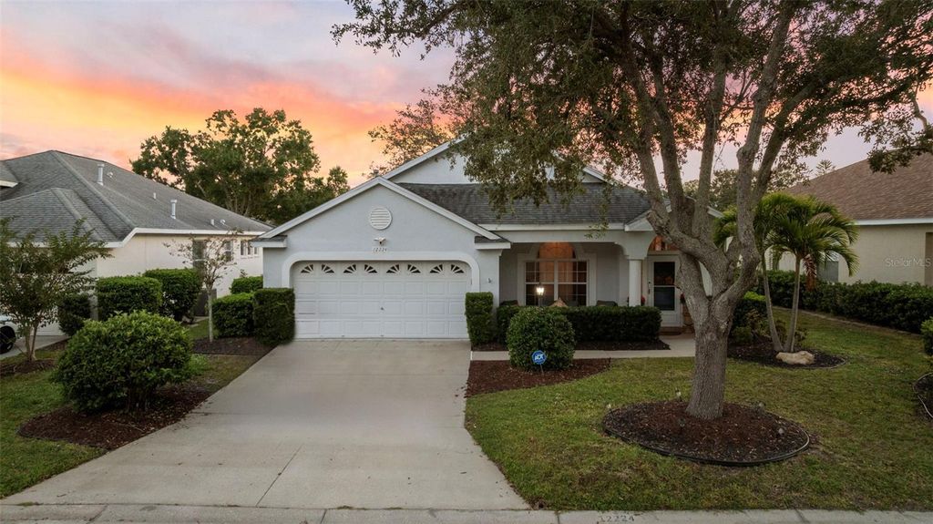 Photo of 12224 Winding Woods Way, Lakewood Ranch, FL 34202 (MLS # C7520604)