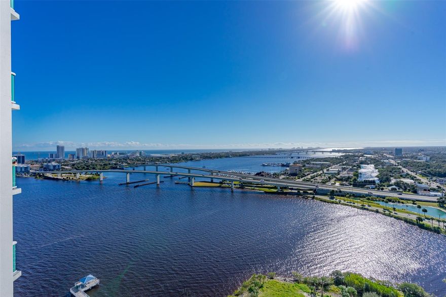 Spectacular view from your sunny 24th Floor SE facing  balcony! Never miss a rocket launch or sunrise. Recently opened and renovated kitchen with high quality finishes to make the most of your cooking activities. Split floor plan with room for your family or guests. Pet friendly community with restrictions. Marina Grande's amenities can not be beat, with several fitness areas, two beautiful pools, movie theater, library and space for safe gatherings large and small. Ground floor parking spot. New tile, carpet, and AC compressor 2019.Marina slips coming soon, sold separately. ;LocationDescription: Condo ;Water: City