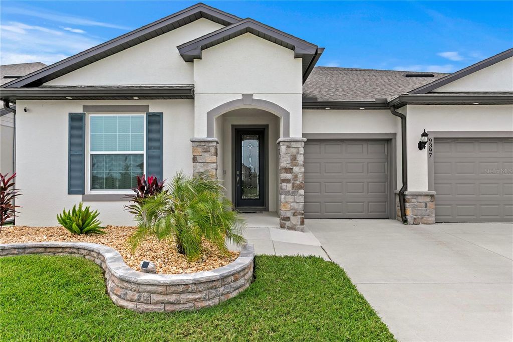 Photo of 9397 Ibis Grove Boulevard, Wesley Chapel, FL 33545 (MLS # TB8428011)
