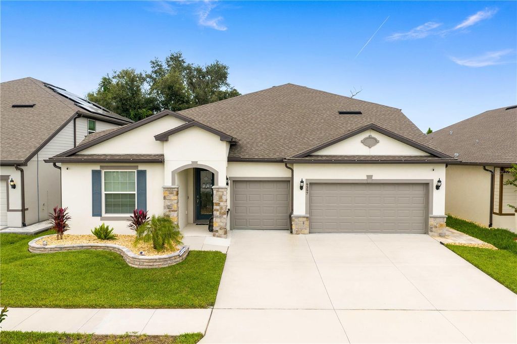 Photo of 9397 Ibis Grove Boulevard, Wesley Chapel, FL 33545 (MLS # TB8428011)