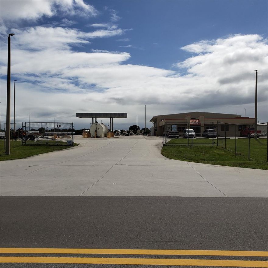 Location is east of Okeechobee city at the intersection of Hwy 710 and SR 15 B and Martin Highway (MCR 714)
Included with property:
5.7 acres of commercial concrete truck parking area 33 acres total
There is a standby diesel powered generator that runs the entire facility at full capacity.
There's been a $10000 update on the lighting system.
The fuel island has 2 new 35 gpm pumps and a 10000 gallon double walled fuel storage tank which are current with all inspections.
The certified scales are in working order.
Located in Okeechobee county OPPORTUNITY ZONE.
There is a fenced parking area with roll back gates.
All furniture and fixtures remain with the property.
Refrigeration and a/c are maintained by Trac Air and are serviced regularly.
Present zoning is Agriculture with a special exception for truck terminal.  Special exception is transferable with the property.
THIS IS A TURN KEY OPERATION