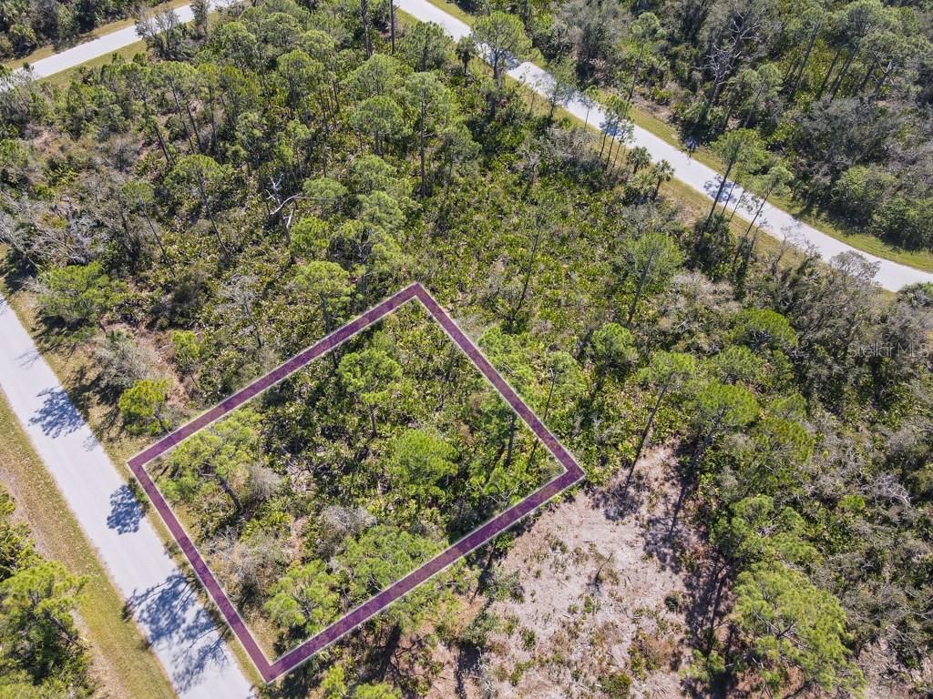 Photo of 15179 Watkins Avenue, Port Charlotte, FL 33953 (MLS # C7505833)
