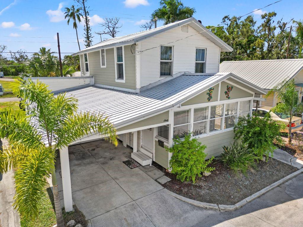 Charming 1925 Cottage in Historic Braden Castle Park (55+ Community)! This community is a hidden gem and a great value. Enjoy the perfect blend of Old Florida charm and modern updates in this 3BR/1BA home along the Manatee River. This vibrant waterfront community offers direct Gulf access, private boat slips, dry docks, boat storage, RV lots to rent, a fishing pier, and an active clubhouse with year-round social events. The home has been renovated both interior and exterior, featuring a new metal roof, new electrical system, new windows, new luxury vinyl plank flooring, fresh paint, and Hardboard siding. Enjoy the historic, unique character and much more with very low HOA fees. Ideal for a year-round home, seasonal retreat, or vacation getaway. Easy access to Tampa Bay, the Gulf Islands, and renowned beaches. Experience Braden Castle, a true old FL waterfront lifestyle full of charm and community spirit!