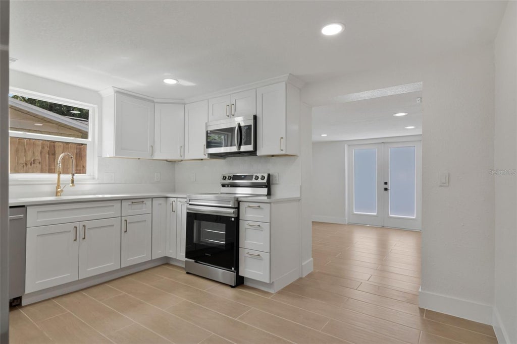 Photo of 4539 Needle Palm Drive, New Port Richey, FL 34652 (MLS # TB8554175)