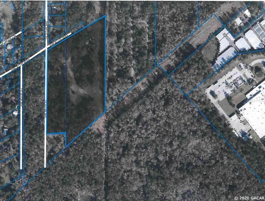 LOCATION LOCATION! Incredible redevelopment 12.41 acres across from Celebration Point, just south from Archer Road. Beautiful property . Current zoning is R-2. With approved re-zoning might be ideal for medical facility,apartments, retail.2 Tax Parcel #s, 06972-000-000 and 06973-000-000. Will not sell separately. (8.41 ac)has old home with asbestos siding and MH that need torn down and removed. This is a true developers dream. This is a deal waiting to happen! By appointment only LA must be present to show.