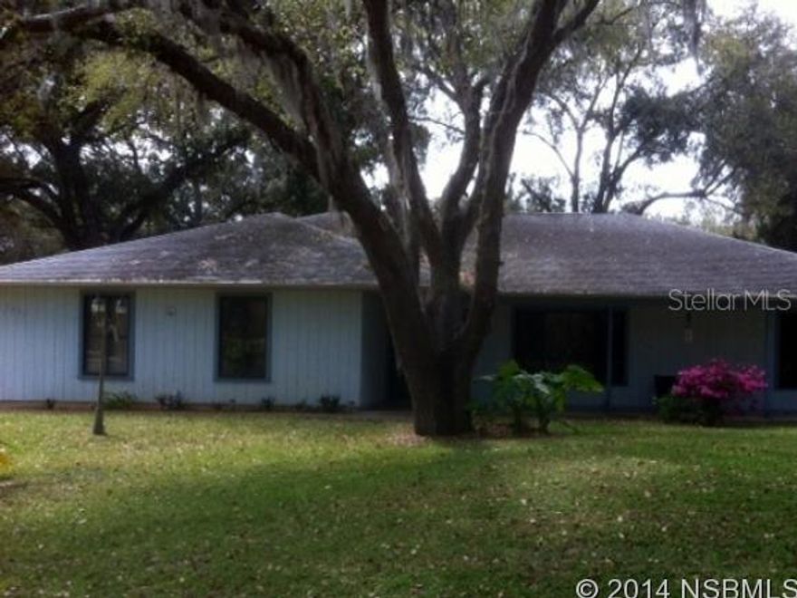 This is a spacious home on a large 3 lot corner. Master bath has walk in shower, walk in closets and make up area.  All 18 inch tile flooring. Vaulted ceiling. Fenced back yard. Boat parking. Oversized 2 car garage with sliding screen door that goes across. Nice shade trees. A/C is only 3 years old.  Screened garage and screened porch.  Sprinkler system. ;Water: City