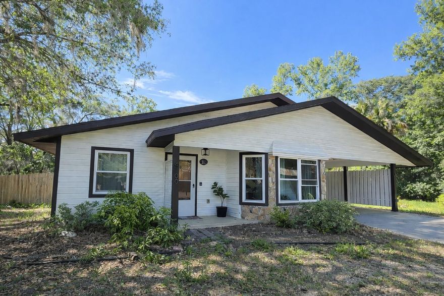 One or more photo(s) has been virtually staged. MUST SEE!  Charming and move-in ready, this beautifully updated 3-bedroom, 2-bath home in Crystal River offers comfort, flexibility, and an ideal location close to everything the Nature Coast has to offer. Situated on a quiet cul-de-sac, this home is just half a mile from the public boat ramp and minutes from the Crystal River Preserve, shopping, dining, and Citrus County’s renowned golf courses. Inside, you will find a spacious living room plus an additional den for extra gathering space, along with a flexible bonus room created from the enclosed lanai that can serve as a home office, guest room, hobby room, or second living area. The bright kitchen features a beautiful bay window, new range, dishwasher, microwave, and a like-new side-by-side refrigerator. There is a separate laundry room. Recent upgrades include a new air conditioner and handler, new circuit panel, new stained concrete floor in the bedrooms and in the main living areas, fresh interior and exterior paint, and extensive repairs already completed. The enclosed carport adds extra functionality and storage. Whether you are looking for a full-time residence, seasonal getaway, or investment opportunity, this well-maintained home is ready for its next owner.