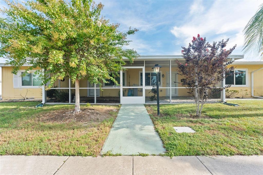 Photo of 1013 Rickenbacker Drive, Sun City Center, FL 33573 (MLS # W7878179)
