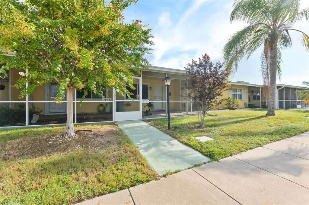 Photo of 1013 Rickenbacker Drive, Sun City Center, FL 33573 (MLS # W7878179)