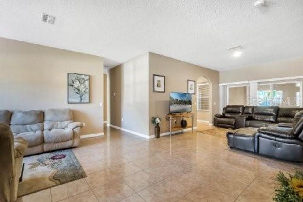 Photo of 468 Acacia Tree Way, Kissimmee, FL 34758 (MLS # O6388748)